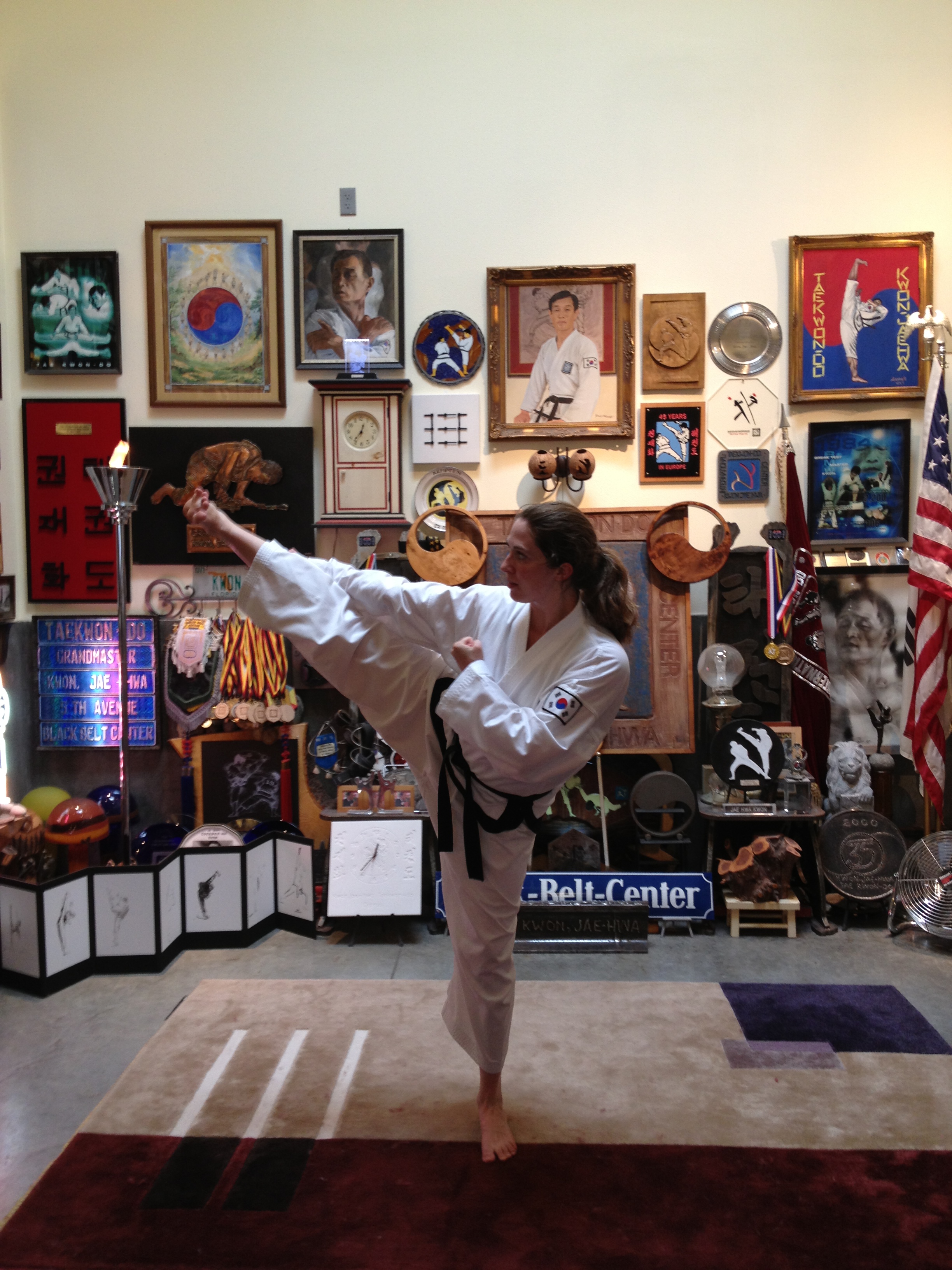 Anna Pickhan doing a kick showing perfect strength and balance at the dojang of grandmaster Kwon 